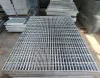 Various angles of Welded Steel Grating, showing the integration of load-bearing bars and crossbars with surface treatment
